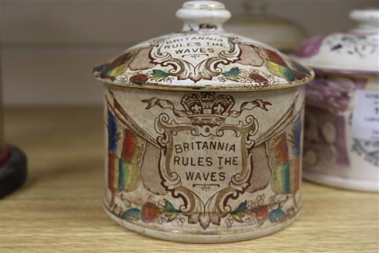 A Sunderland pink lustre jar and cover and two other jars and covers
